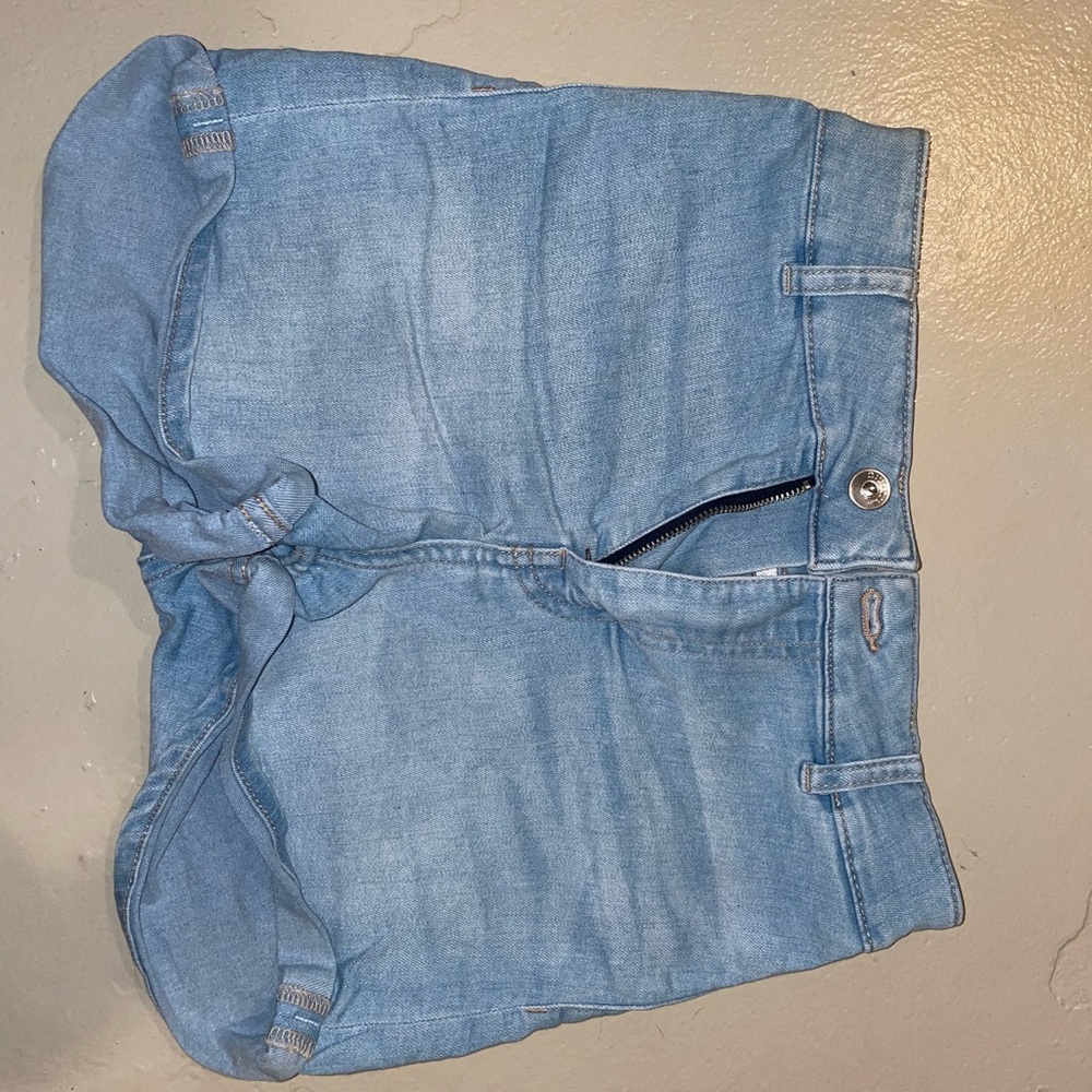 Light wash jean shorts. Very stretchy. Worn maybe two times